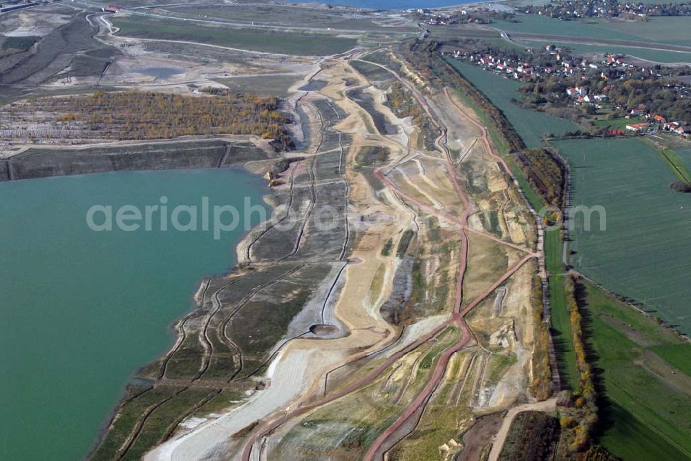 Aerial image Leipzig - Blick auf den Störmthaler See - dieser entsteht zur Zeit südlich von Leipzig durch die Flutung des Südostteils des ehemaligen Braunkohletagebaus Espenhain. Direkt benachbart ist der Markkleeberger See. Etwa im Jahr 2011 soll der Störmthaler See seinen Endwasserstand erreicht haben. Geplant ist das Wassersportzentrum Gruna auf der Magdeborner Halbinsel (Kanuregattastrecke, Segelhafen, Strand).