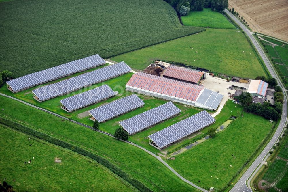 Groven from the bird's eye view: View of an area for round bale storage with photovoltaics in Groven in the state Schleswg-Holstein