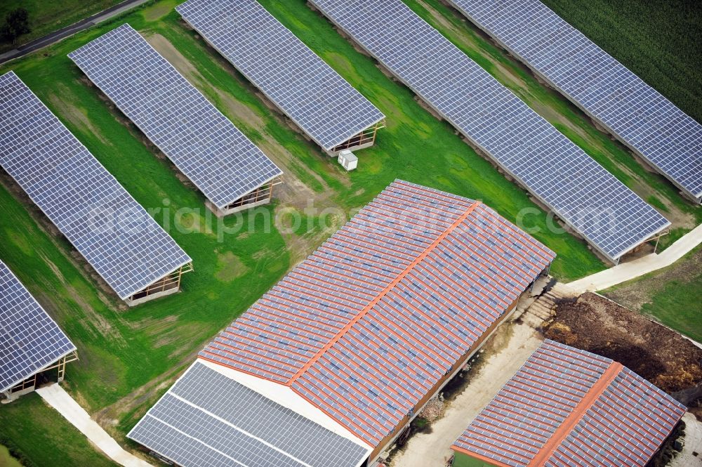 Groven from above - View of an area for round bale storage with photovoltaics in Groven in the state Schleswg-Holstein