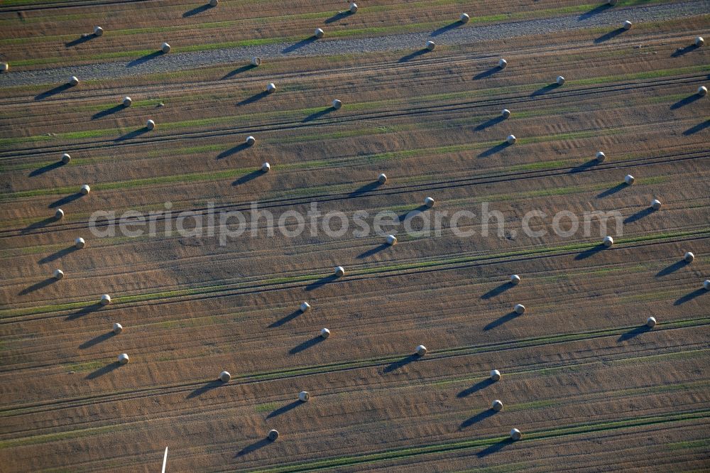 Aerial image Karstädt - Straw bale landscape in a field on the outskirts in Karstaedt in the state Brandenburg