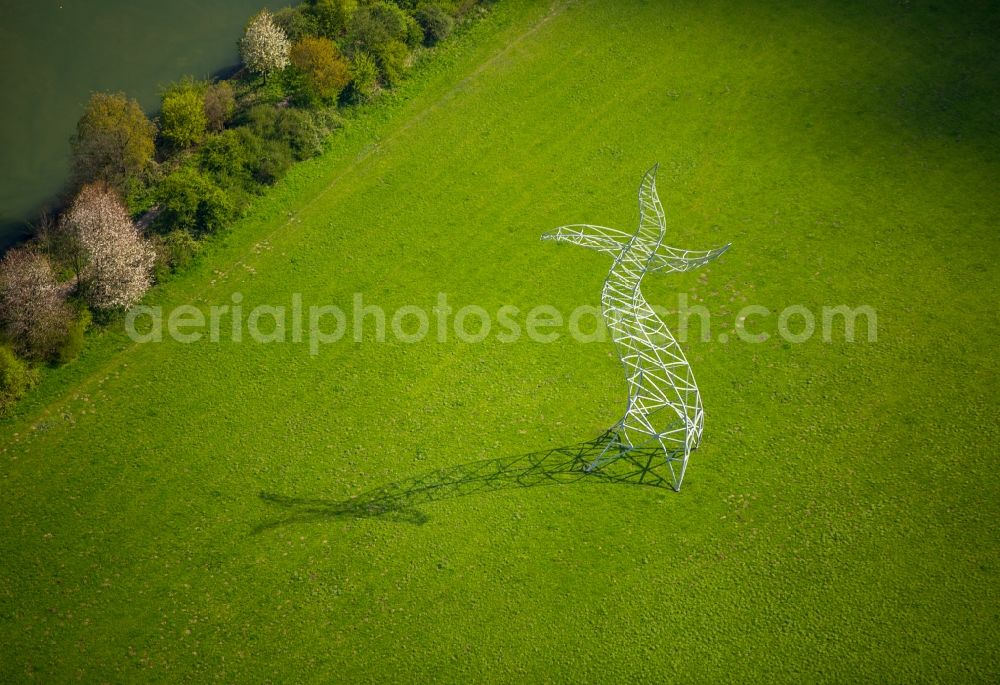 Aerial photograph Oberhausen - Power tower-construction of a road and Interconnector Steel sculpture sorcerer - dancing electricity pylon in Oberhausen in the state North Rhine-Westphalia