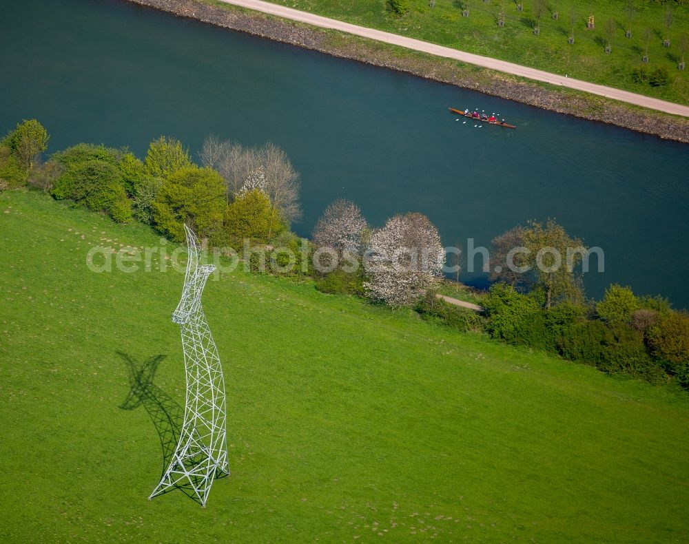 Oberhausen from above - Power tower-construction of a road and Interconnector Steel sculpture sorcerer - dancing electricity pylon in Oberhausen in the state North Rhine-Westphalia