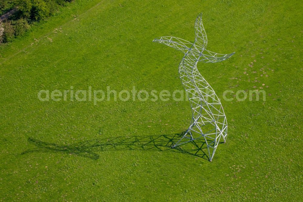 Aerial photograph Oberhausen - Power tower-construction of a road and Interconnector Steel sculpture sorcerer - dancing electricity pylon in Oberhausen in the state North Rhine-Westphalia