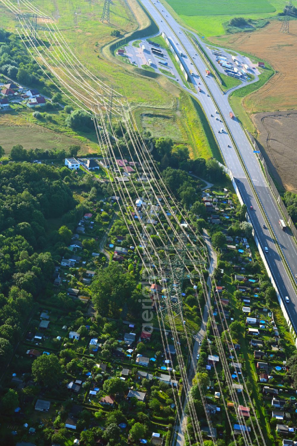 Schwanebeck from above - Electricity pylon construction of a route and interconnection line along the A10 motorway in Schwanebeck in the state of Brandenburg, Germany