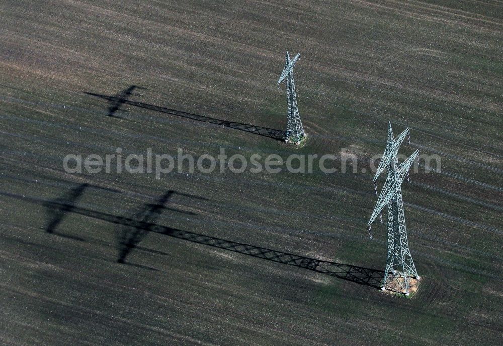 Magdala from the bird's eye view: Ironman with shadows at a field near Magdala / Ottstedt in Thuringia