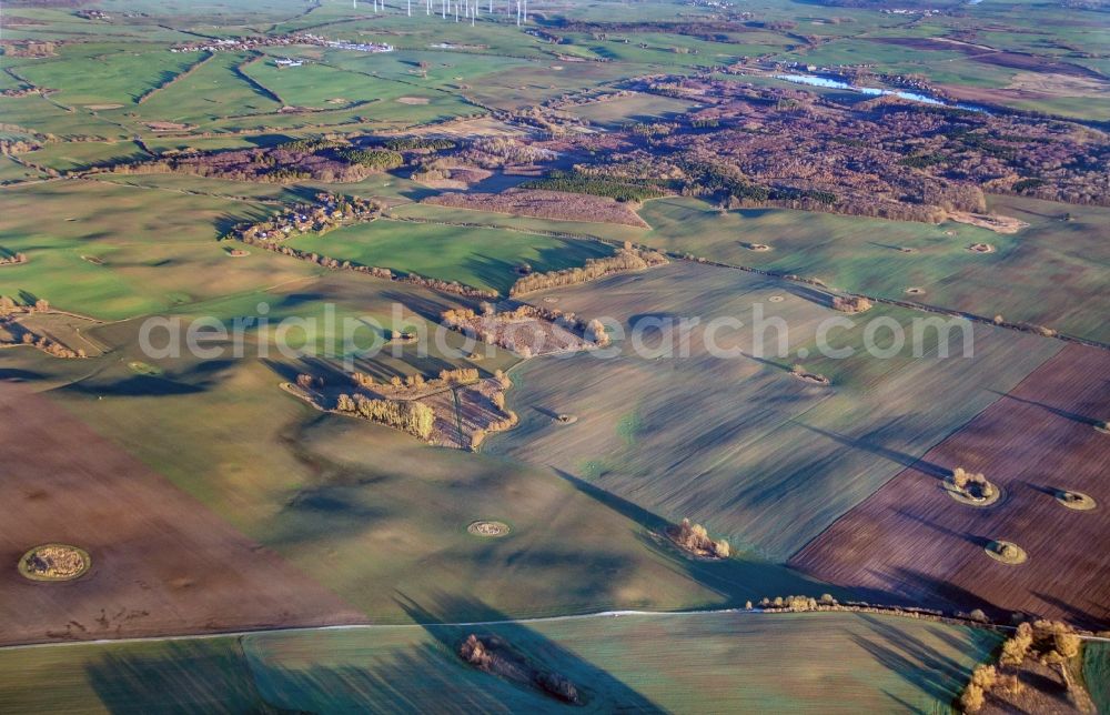 Aerial image Petersdorf - Structures on agricultural fields in evening light in Petersdorf in the state Mecklenburg - Western Pomerania, Germany