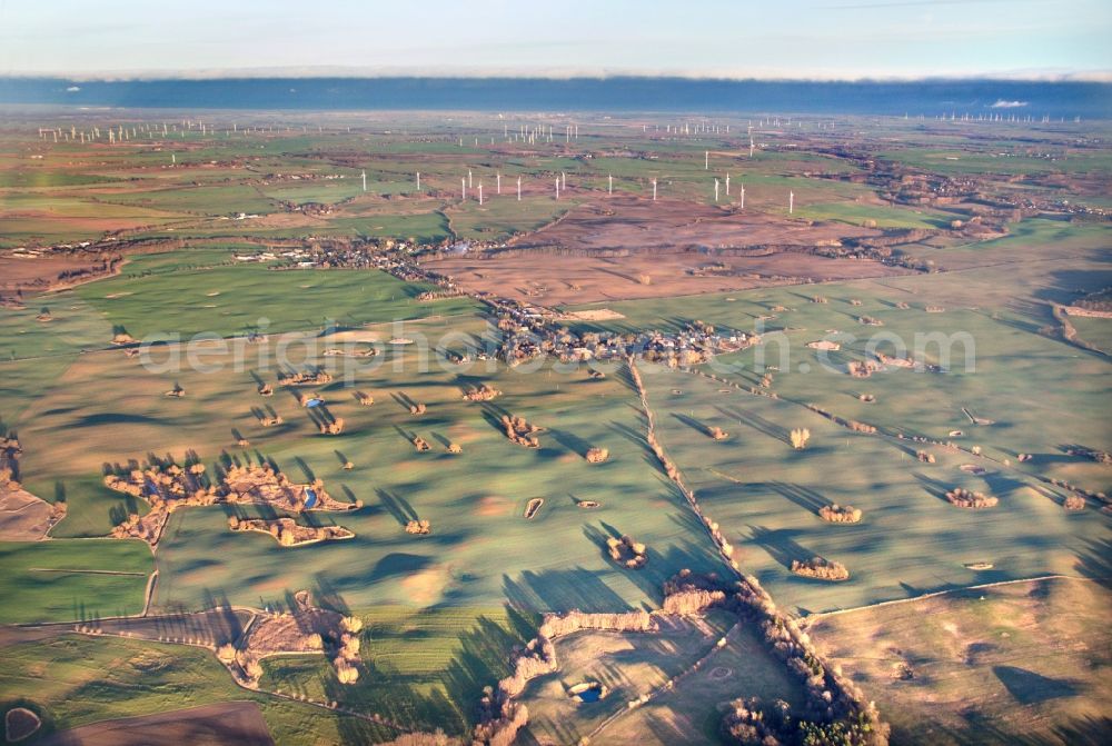 Aerial image Petersdorf - Structures on agricultural fields in evening light in Petersdorf in the state Mecklenburg - Western Pomerania, Germany