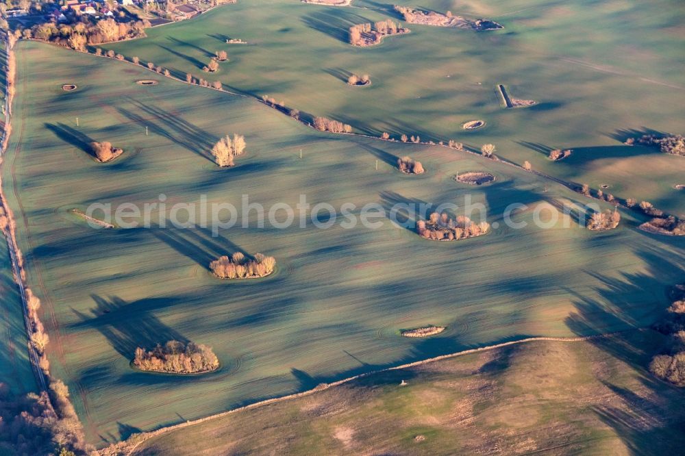 Aerial photograph Petersdorf - Structures on agricultural fields in evening light in Petersdorf in the state Mecklenburg - Western Pomerania, Germany