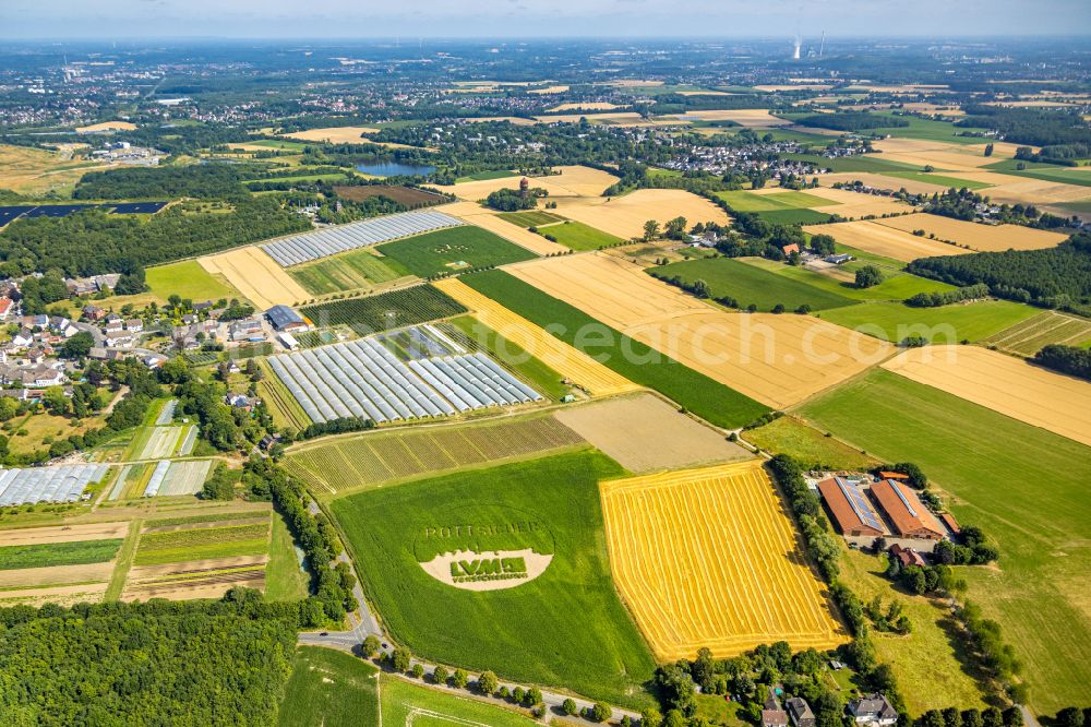 Dortmund from above - Structures on agricultural fields in the form of the LVM insurance logo in Dortmund at Ruhrgebiet in the state North Rhine-Westphalia, Germany