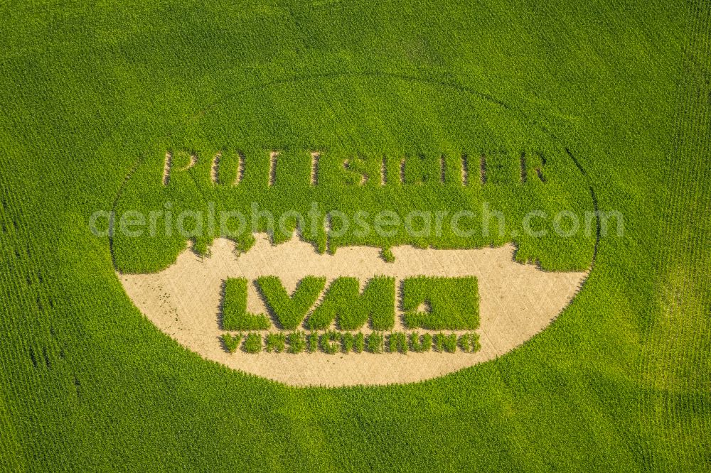 Dortmund from the bird's eye view: Structures on agricultural fields in the form of the LVM insurance logo in Dortmund at Ruhrgebiet in the state North Rhine-Westphalia, Germany