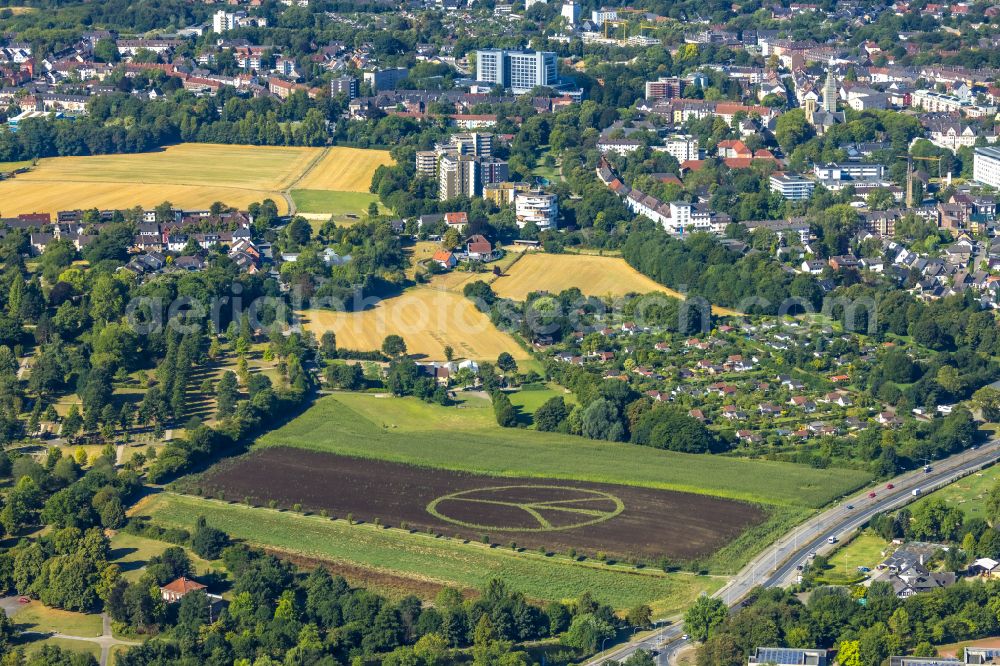 Herne from above - Structures on agricultural fields in the form of a peace sign on the Schulte-Goecking farm on Sodinger Strasse in Herne in the Ruhr area in the state of North Rhine-Westphalia, Germany