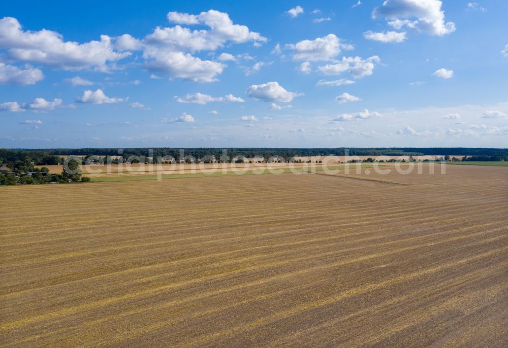 Velten from above - Structures on agricultural fields after harvest in Velten in the state Brandenburg, Germany