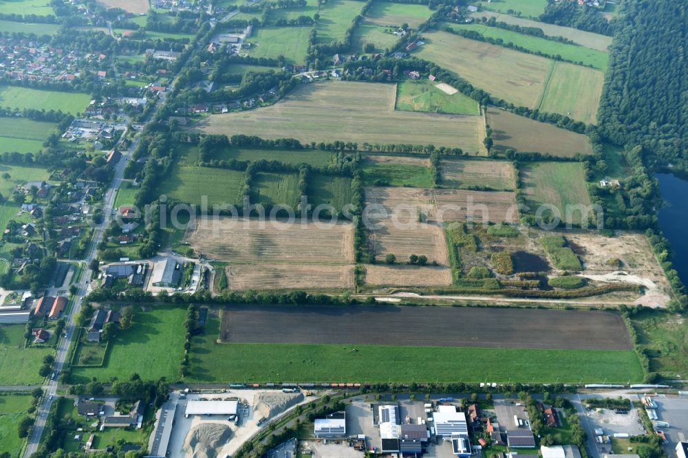 Aerial photograph Aurich - Structures on agricultural fields near the industrial estate Sandhorst in Aurich in the state Lower Saxony