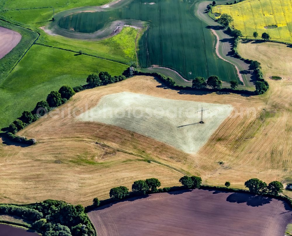 Aerial photograph Großbarkau - Structures on agricultural fields and Stromtrasse in Grossbarkau in the state Schleswig-Holstein, Germany