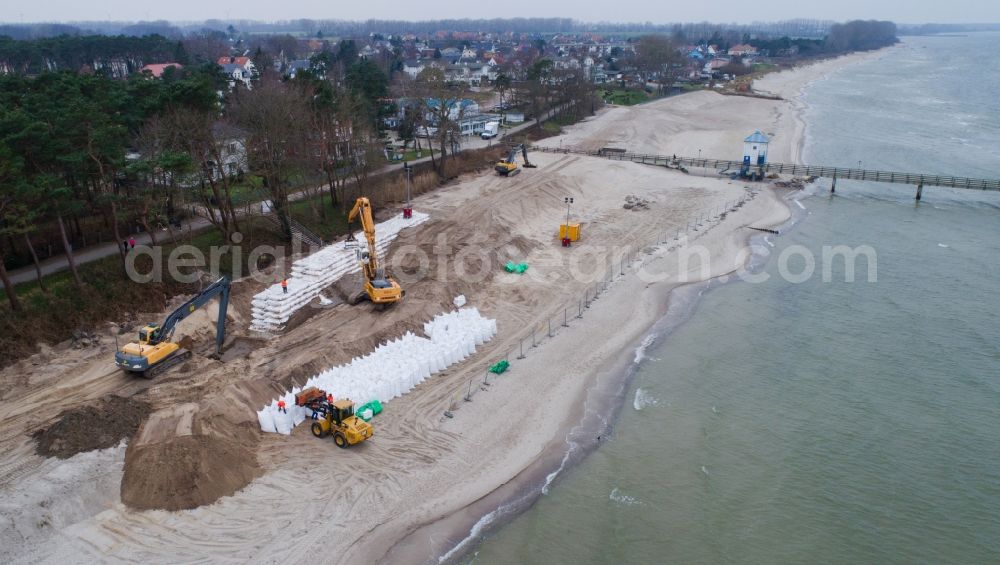 Lubmin from above - Construction site for the construction of a storm surge protection structure in the sandy beach landscape along the coastline of Baltic Sea in Lubmin in the state Mecklenburg - Western Pomerania, Germany