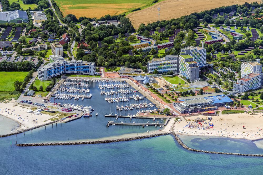 Ostseebad Damp from the bird's eye view: Storm damage to the pleasure boat and sailboat pier and boat berths in the harbor Yachthafen Damp on the street Zur Niebymole in Ostseebad Damp in the state Schleswig-Holstein, Germany