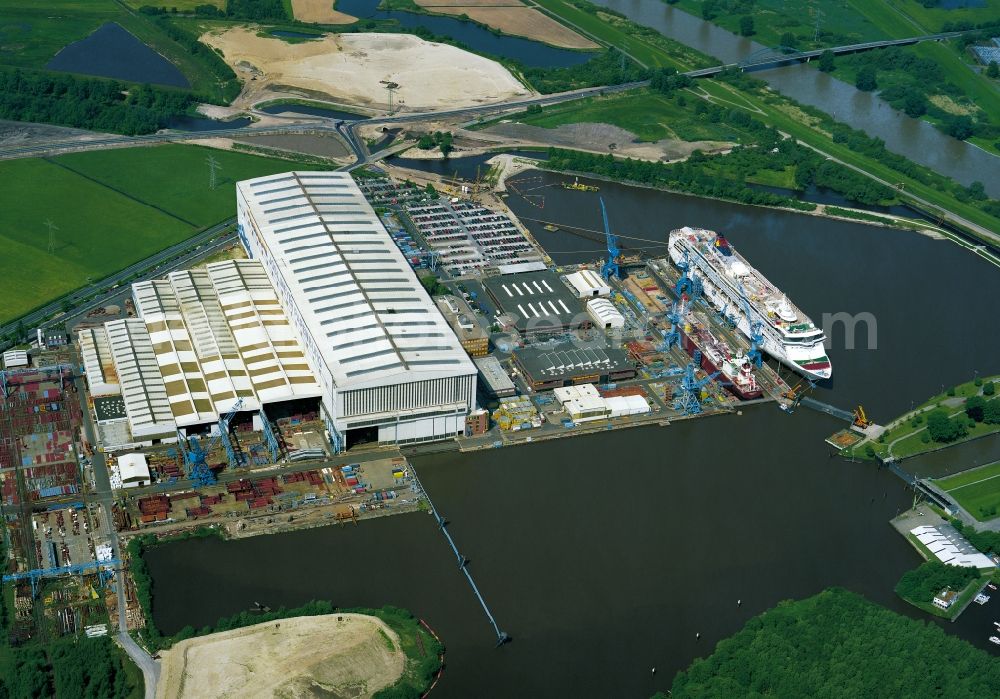 Aerial image Papenburg - View of the Superstar Virgo cruise ship / passenger ship on the Meyer shipyard in Papenburg on the river Ems in Lower Saxony