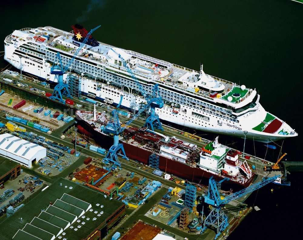 Aerial photograph Papenburg - View of the Superstar Virgo cruise ship / passenger ship on the Meyer shipyard in Papenburg on the river Ems in Lower Saxony