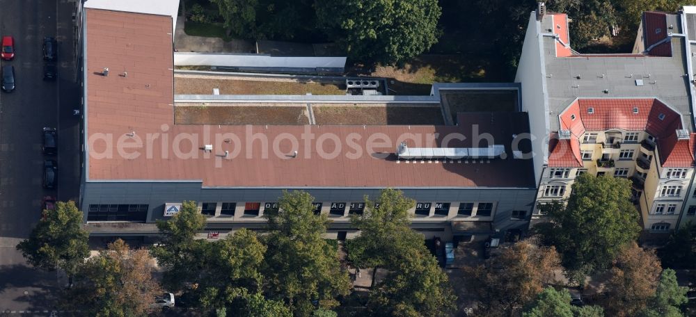 Berlin from above - Store of the Supermarket Aldi in a residential area in the Warnemuender Strasse in Berlin