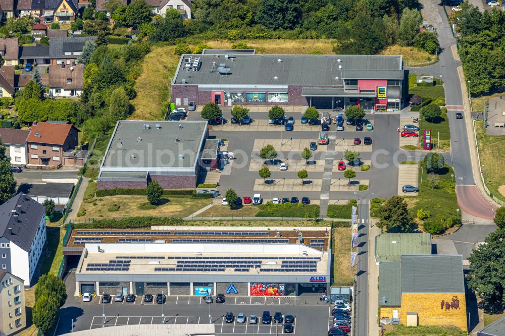 Witten from the bird's eye view: Store of the Supermarket Edeka and Aldi on Haldenweg in Witten at Ruhrgebiet in the state North Rhine-Westphalia, Germany