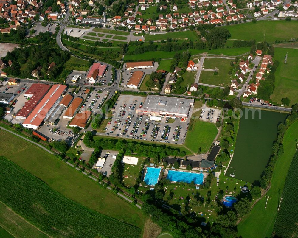 Aerial image Feuchtwangen - Store of the Supermarket Kaufland Feuchtwangen and Natur- Und Solarfreibad Schleifweiher in Feuchtwangen in the state Bavaria, Germany