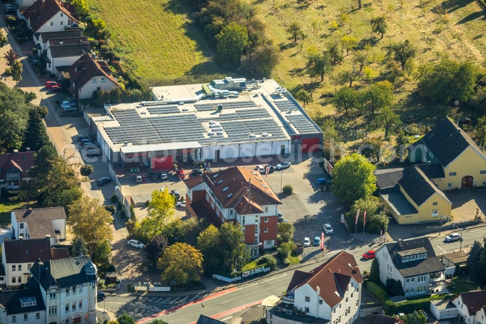 Unna from the bird's eye view: Store of the Supermarket Rewe Engel Unna Massen on Massener Hellweg in Unna in the state North Rhine-Westphalia, Germany