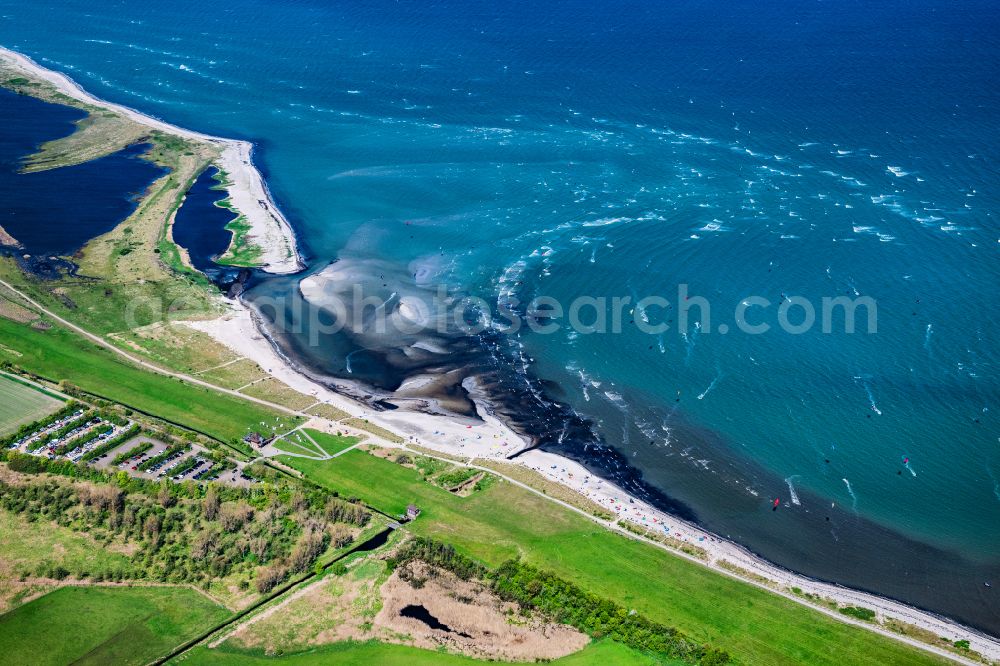 Aerial image Puttgarden - Surfer - kitesurfer in motion Gruener Brink in Puttgarden on the island on street Kabunskoppel of Fehmarn in the state Schleswig-Holstein, Germany