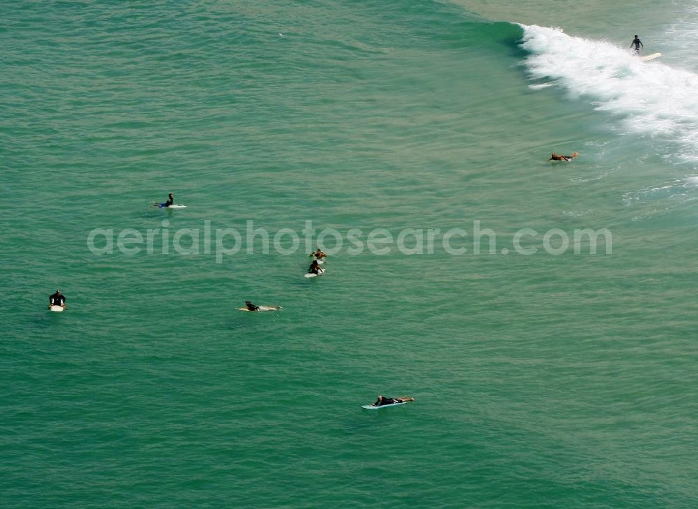 Aerial image Rio de Janeiro - Surfer - surfistas on the beach and coastal area in Rio de Janeiro in Brazil