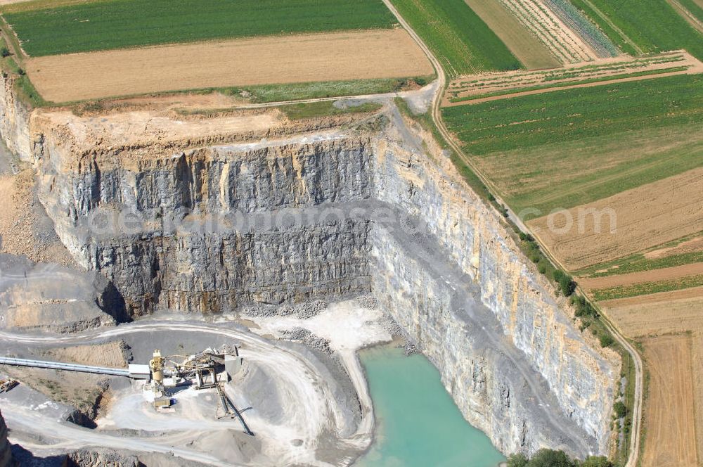 Aerial photograph Heimsheim - Blick auf das Tagebau Heimsheim, dort wird Splitt und Schotter abgebaut. Die zuständige Firma ist Heinrich Mertz Kies- und Sandwerke GmbH & Co. KG. Adresse: Augsburger Str. 235 B, 70327 Stuttgart Tel.: (07 11) 30 50 6-0