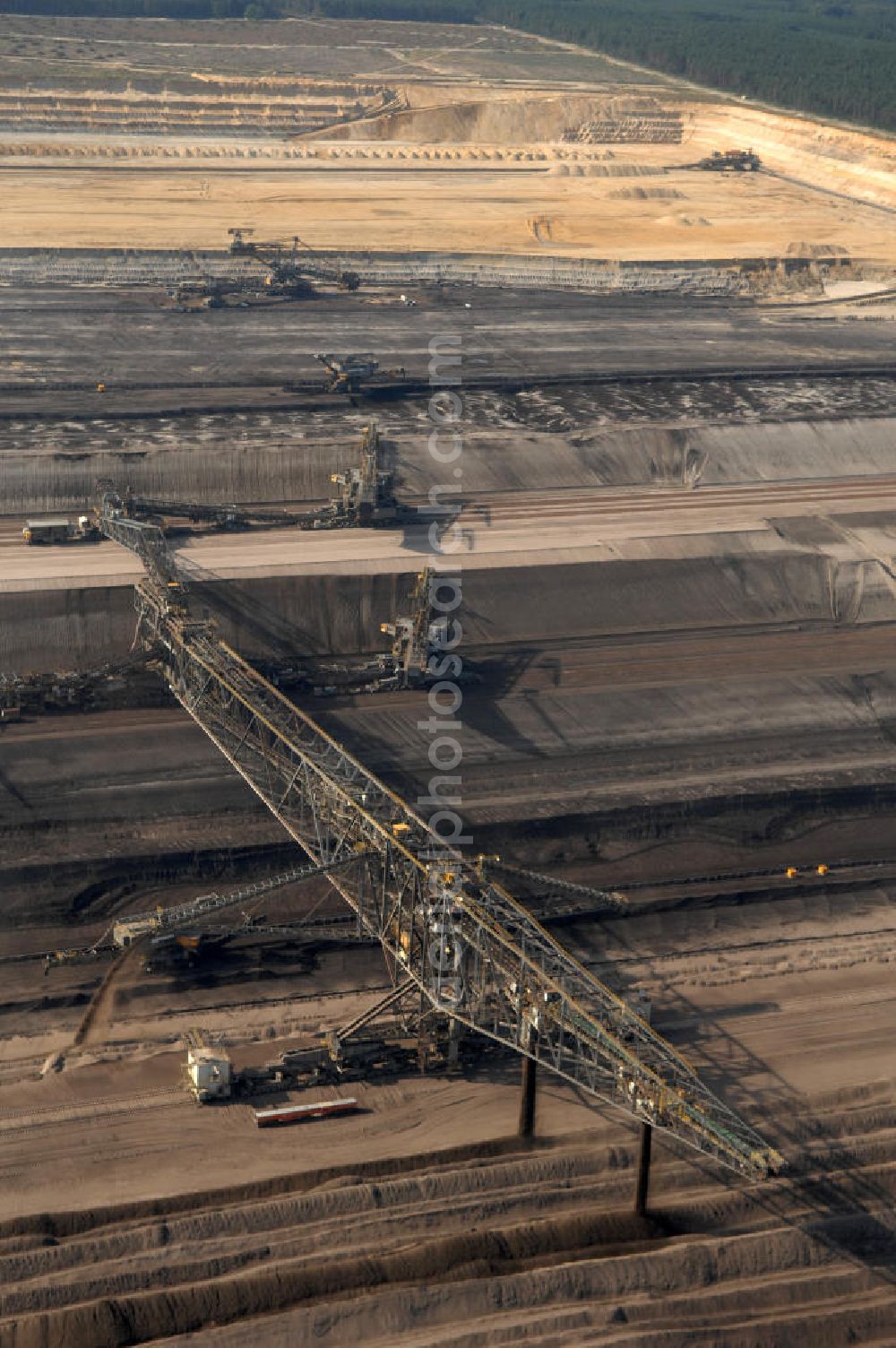 Nochten from the bird's eye view: Blick auf den Tagebau Nochten in Sachsen. Der Tagebau Nochten ist ein Braunkohletagebau in der Oberlausitz im Landkreis Görlitz, der von der Vattenfall Europe Mining AG betrieben wird. Der Betreiber Vattenfall Europe Mining ist mit ca. 7000 Beschäftigten der größte Arbeitgeber und Steuerzahler der Lausitz. Kontakt: Vattenfall Europe Mining AG, Tel. +49 0355 2887 3051,