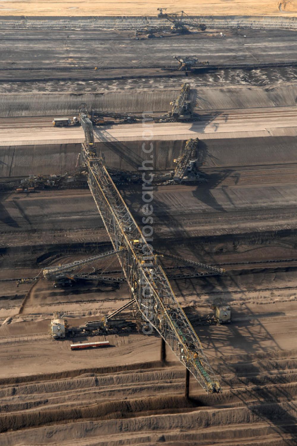 Aerial image Nochten - Blick auf den Tagebau Nochten in Sachsen. Der Tagebau Nochten ist ein Braunkohletagebau in der Oberlausitz im Landkreis Görlitz, der von der Vattenfall Europe Mining AG betrieben wird. Der Betreiber Vattenfall Europe Mining ist mit ca. 7000 Beschäftigten der größte Arbeitgeber und Steuerzahler der Lausitz. Kontakt: Vattenfall Europe Mining AG, Tel. +49 0355 2887 3051,