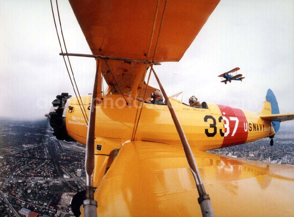 Aerial image Berlin - Take Off 92 Atlantiküberquerer Klaus Plasa fliegt eine Boeing Stearman 20.04.1992