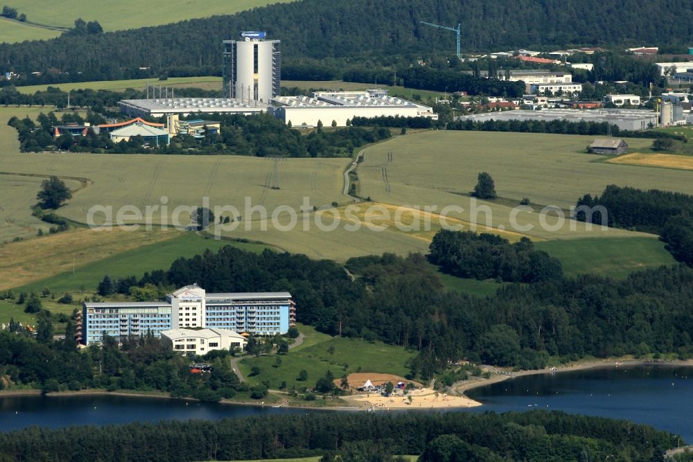 Aerial photograph Zeulenroda-Triebes - Bio Seehotel, Waikiki swimming world, Bauerfeind - tower and office building of Bauerfeind AG by the dam Zeulenroda near Zeulenroda-Triebes in the state of Thuringia