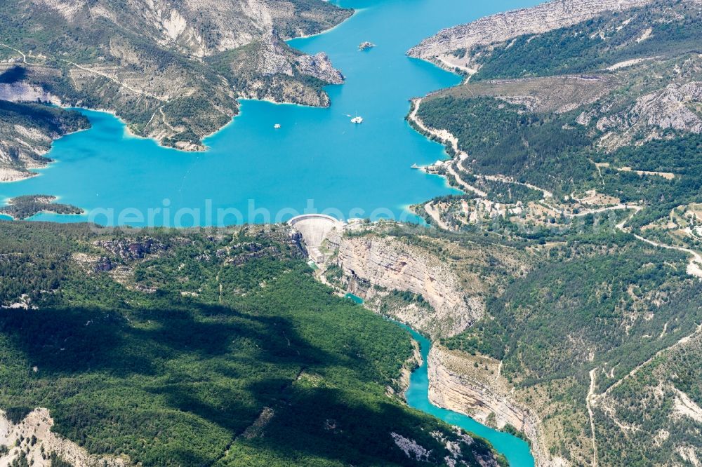 Aerial image Demandolx - Dam and shore areas of Electricite de France (EDF) at the lake Lac de chaudanne in Demandolx in Provence-Alpes-Cote d'Azur, France