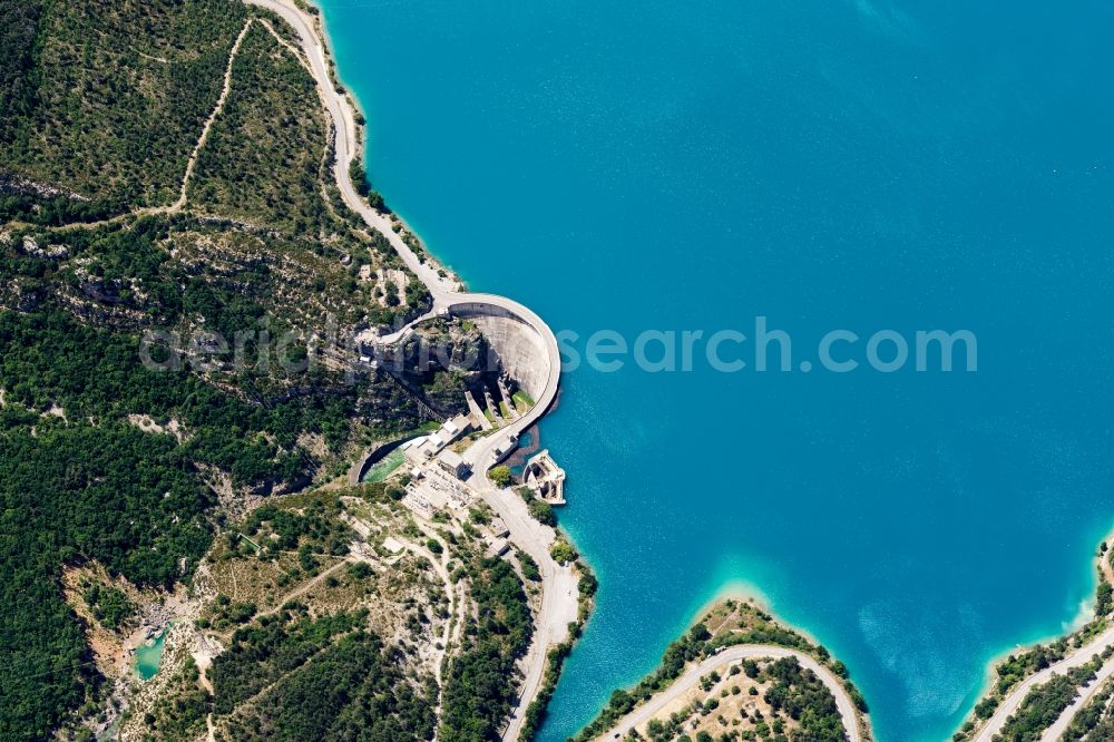 Aerial image Demandolx - Dam and shore areas of Electricite de France (EDF) at the lake Lac de chaudanne in Demandolx in Provence-Alpes-Cote d'Azur, France