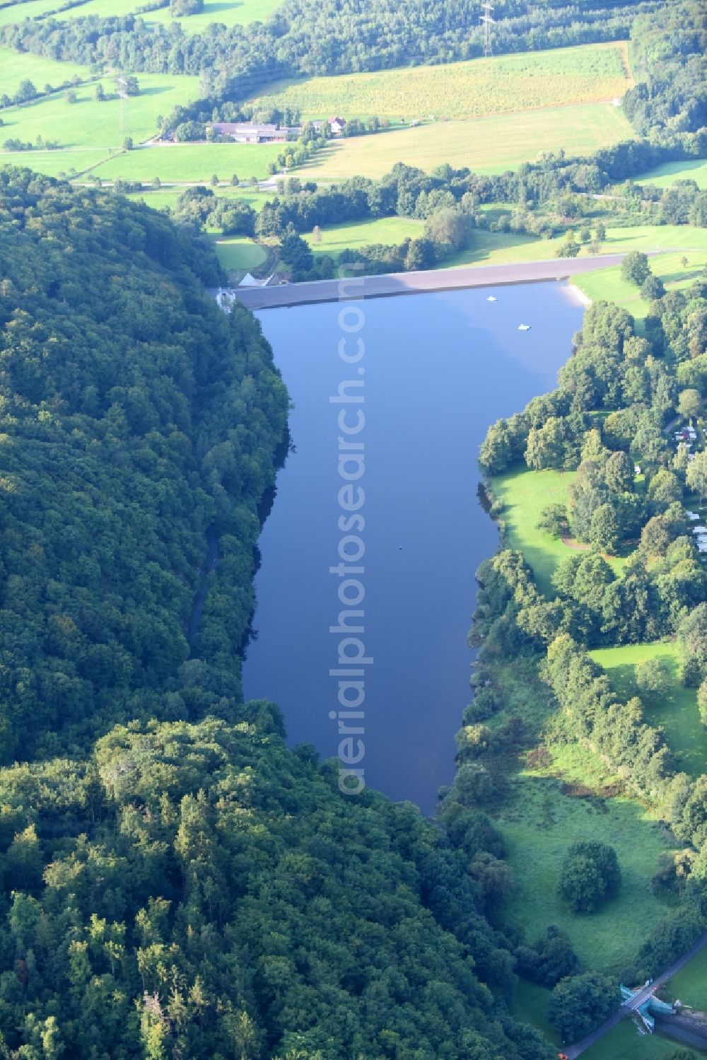 Greifenstein from above - Dam and shore areas at the lake Ulmbach in Greifenstein in the state Hesse, Germany