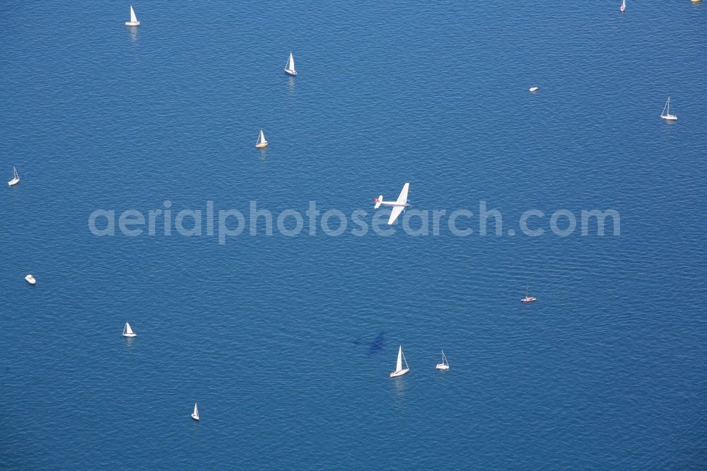 Friedrichshafen from the bird's eye view: The historic Ju 52 flies over Lake Constance in Baden-Wuerttemberg