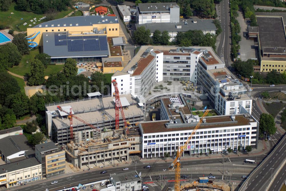 Aerial photograph Mainz - Blick auf das Taubertsbergbad und den Neubau für das Peter-Cornelius-Konservatorium Mainz. Das Peter-Cornelius-Konservatorium der Stadt Mainz ist eine musikalische Ausbildungsstätte für Berufsmusiker und Laien. Kontakt: Dr. Gerhard Scholz, Peter-Cornelius-Konservatorium der Stadt Mainz, Binger Str. 18, 55122 Mainz, Tel.: 06131-25008 12,