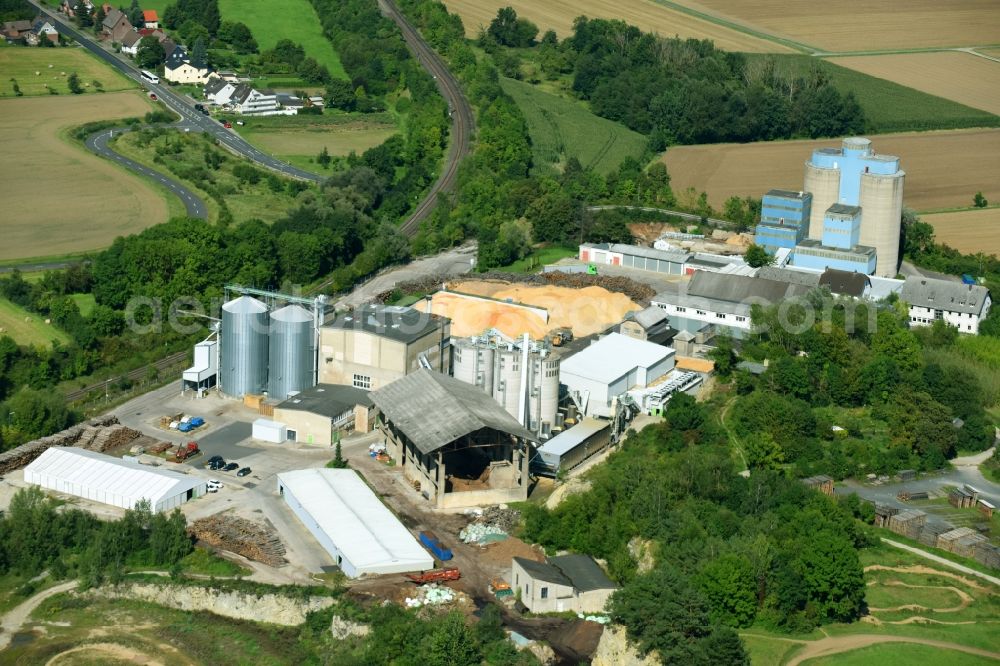 Hardegsen from the bird's eye view: Technical facilities in the industrial area of BEL Leinetal Betriebs GmbH&Co.KG and of bvl biomasse-verwertung- leinetal GmbH along the Zementfabrik in Hardegsen in the state Lower Saxony, Germany