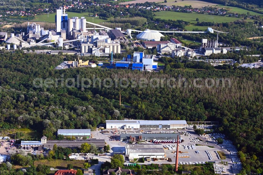 Rüdersdorf from the bird's eye view: Technical facilities in the industrial area overlooking concrete mixing plant - garbage and waste incineration plant and cement plant in Ruedersdorf in the state Brandenburg, Germany