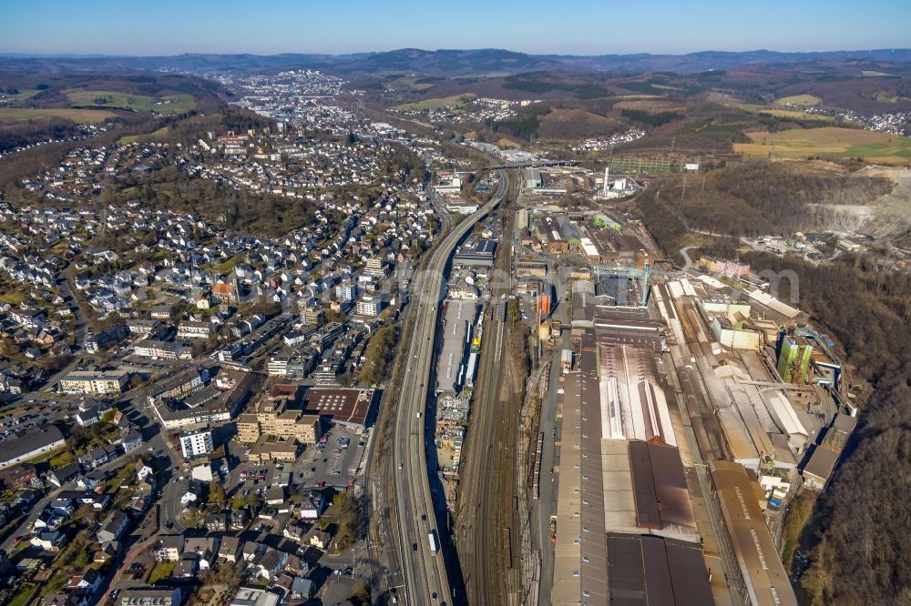 Siegen from above - Technical equipment and production facilities of the steelworks Deutsche Edelstahlwerke GmbH along the road Huetteltalstrasse B54 in Siegen in the state North Rhine-Westphalia