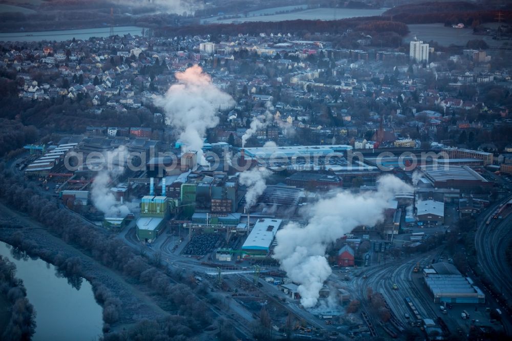 Witten from above - Technical equipment and production facilities of the steelworks der Deutsche Edelstahlwerke GmbH in sunrise in the district Bommern in Witten in the state North Rhine-Westphalia