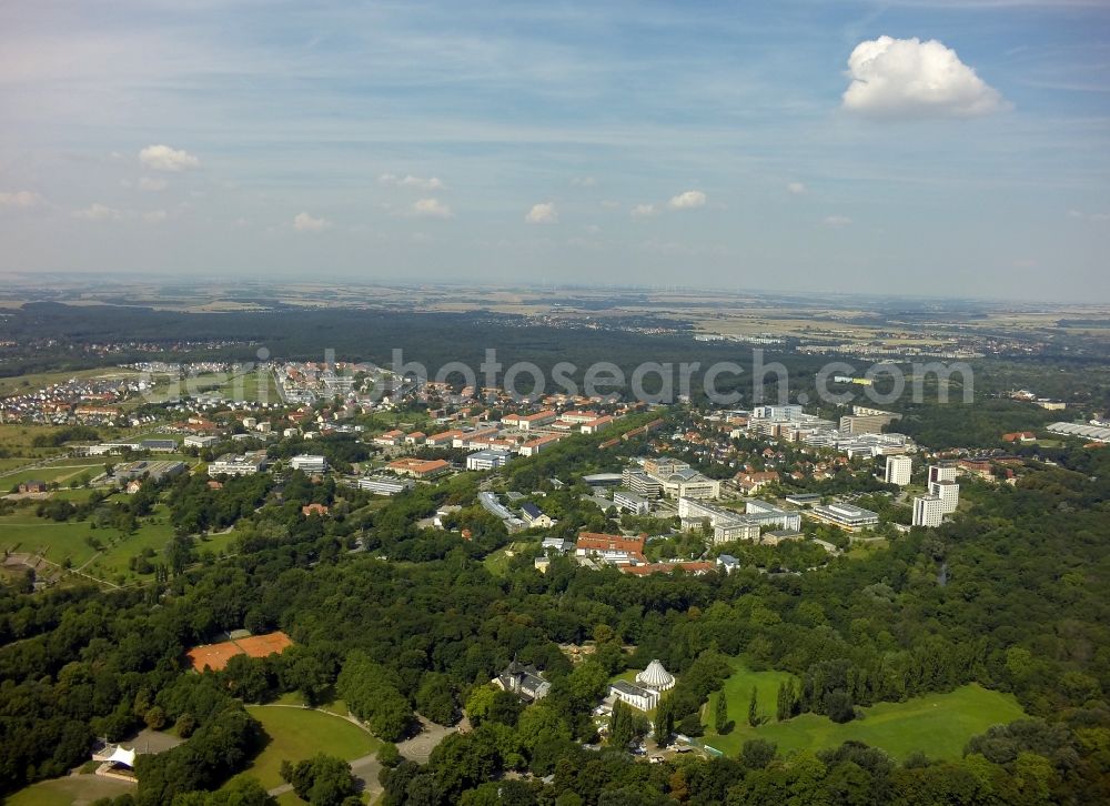 Aerial image Halle (Saale) - The technology and business incubator vineyard is located in the northeast of Halle (Saale) in Saxony-Anhalt. For Weinberg campus of the Martin-Luther-University Halle include different building containing classrooms and lecture halls. On the site you will find the Max Planck Institute of Microstructure Physics, the Leibniz Institute of Plant Biochemistry, the Geological Garden Hall and the University Hospital Halle. The Doehlauer Heath, an urban forest, forms the natural border of the university town. In the foreground the historic tourist restaurant Peissnitzhaus and Planetarium Sigmund Jaehn on the island Peissnitz can be seen