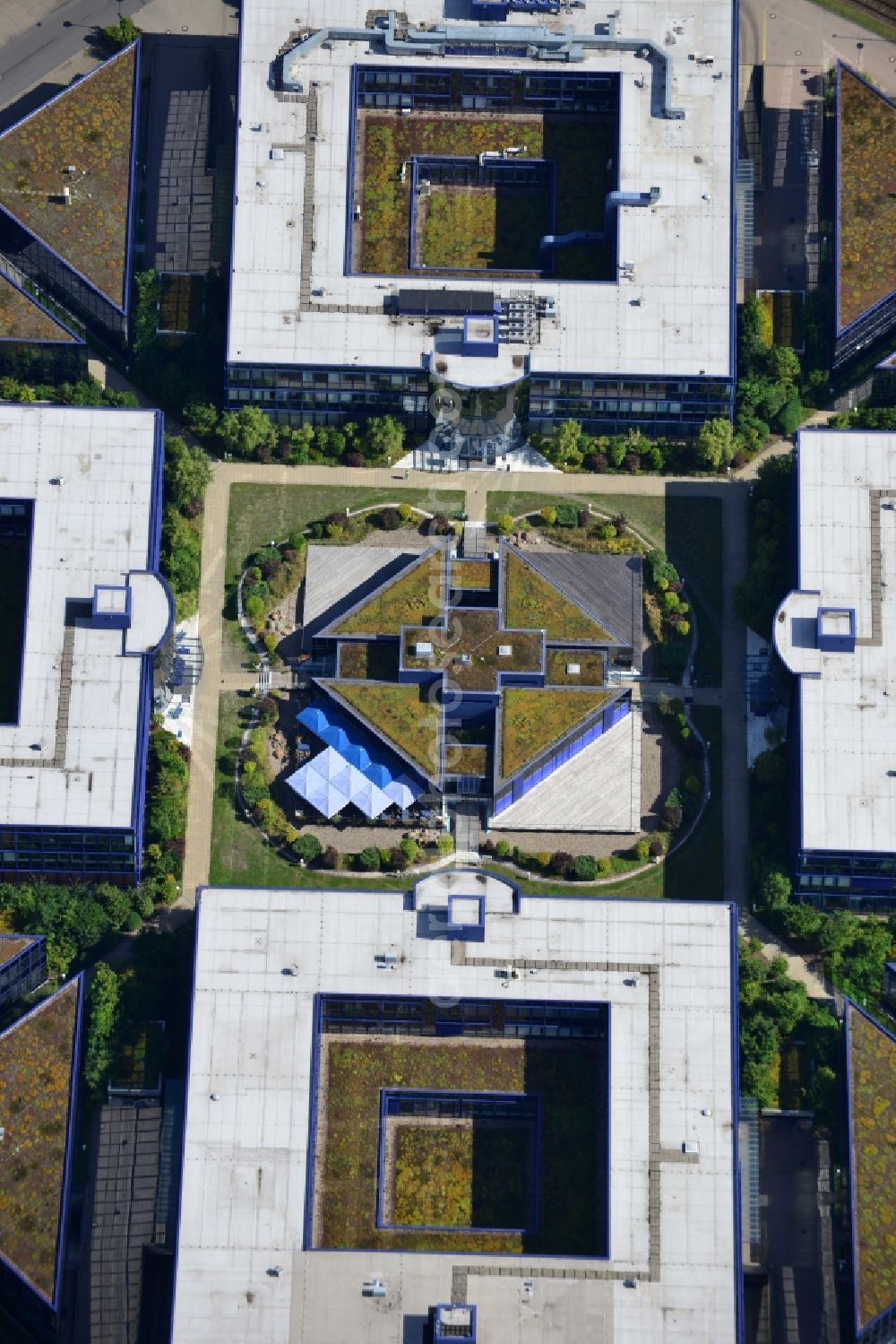 Hennigsdorf from the bird's eye view: Grounds of the Blue Wonder Technology Center in Hennigsdorf in Brandenburg. The technology park Hennigsdorf North offers a business park land for commercial, industrial, service and production