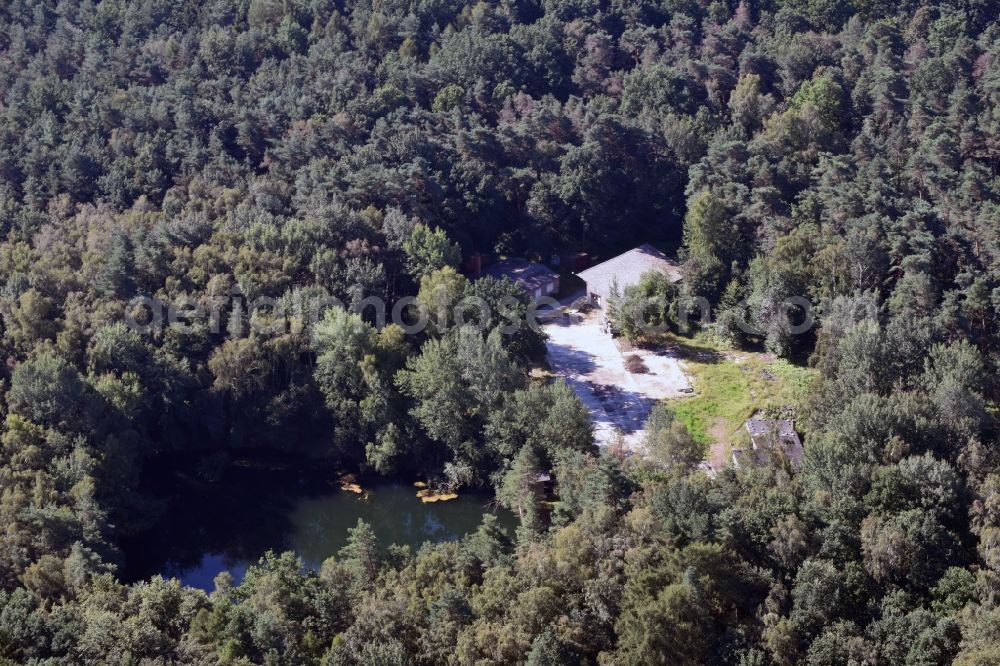 Kamenz from above - Pond and property in a forest in the East of Kamenz in the state of Saxony