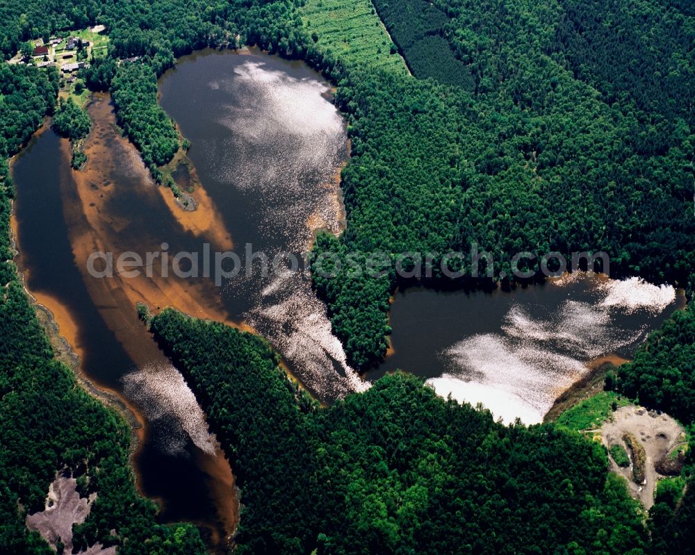 Aerial photograph Weißwasser/Oberlausitz - Ponds and landscape in Weißwasser in the state of Saxony. The area is within the city limits of the district town. It belongs to the lake region of Lausitz which is an artificial water landscape, created through the flooding of former brown coal mines