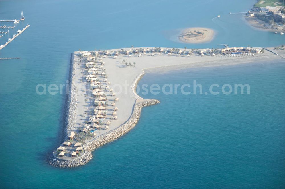 Aerial photograph Ras Al Khaimah - Part of the complex of the Al Hamra Fort Hotel & Beach Resort in the arab emirate Ras Al Khaimah. The resort is part of the construction project Al Hamra Village which is realized by the state-owned company Al Hamra Real Estate