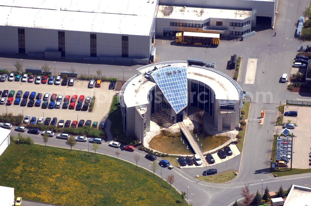 Aerial photograph Oelsnitz - Blick auf einen Teil der Firma Meiser Gitterroste im Industriegebiet am Johannisberg. Edmund Meiser gründete 1956 die Stahl- und Eisenhandelgesellschaft. Kontakt: Meiser Gitterroste KG, Am Lehmteich 3, 08606 Oelsnitz, Tel. +49(0)37421 50 0, Fax +49(0)37421 50 2120,