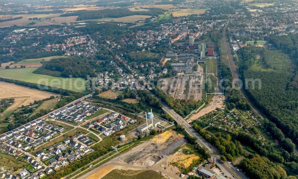 Aerial photograph Gelsenkirchen - Partial demolition work on the abandoned conveyor systems and mining shaft with winding tower DSK Bergwerk Lippe Zeche Westerholt in the coal mining area in the district Hassel in Gelsenkirchen in the Ruhr area in the state North Rhine-Westphalia, Germany