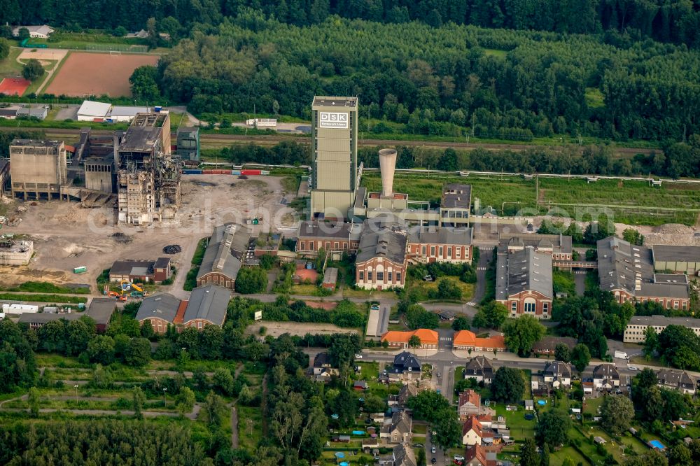 Gelsenkirchen from above - Partial demolition work on the abandoned conveyor systems and mining shaft with winding tower DSK Bergwerk Lippe Zeche Westerholt in the coal mining area in the district Hassel in Gelsenkirchen in the Ruhr area in the state North Rhine-Westphalia, Germany